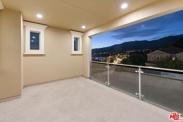 balcony featuring a mountain view