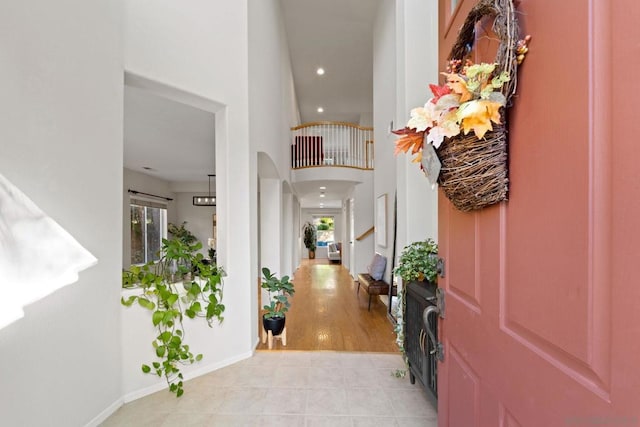 entryway featuring plenty of natural light and light tile patterned flooring