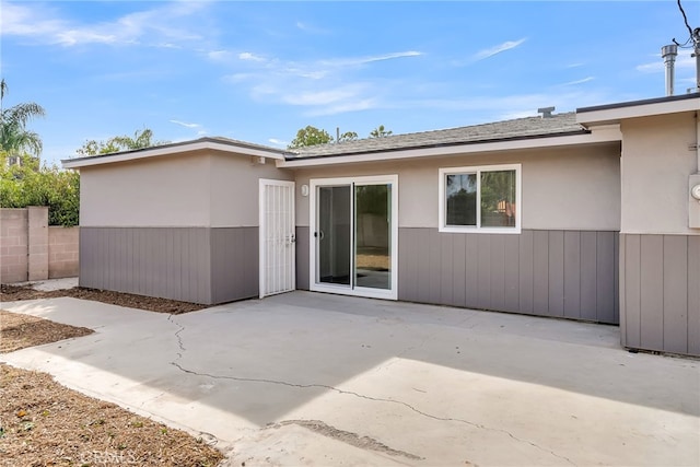 back of property featuring a patio area