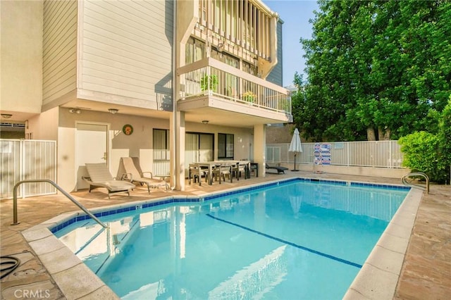 view of pool featuring a patio