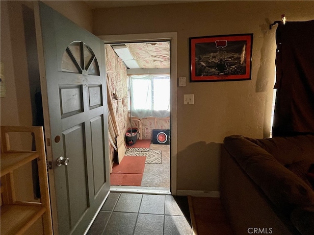 entryway featuring tile patterned floors