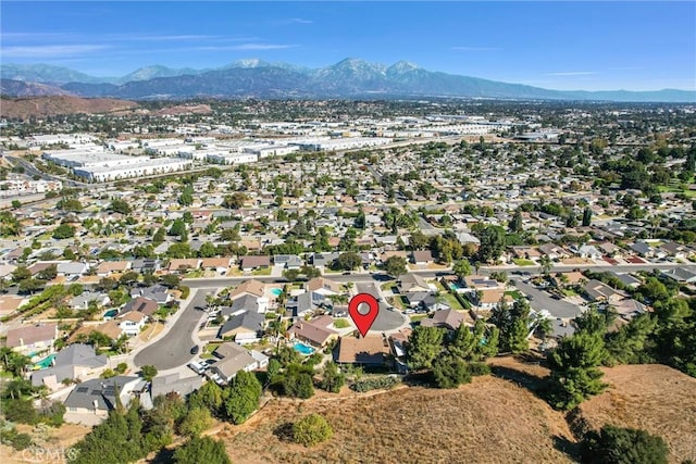 drone / aerial view featuring a mountain view