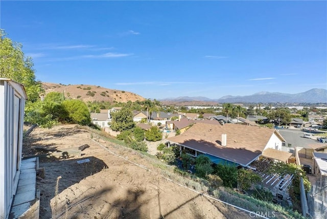 drone / aerial view featuring a mountain view