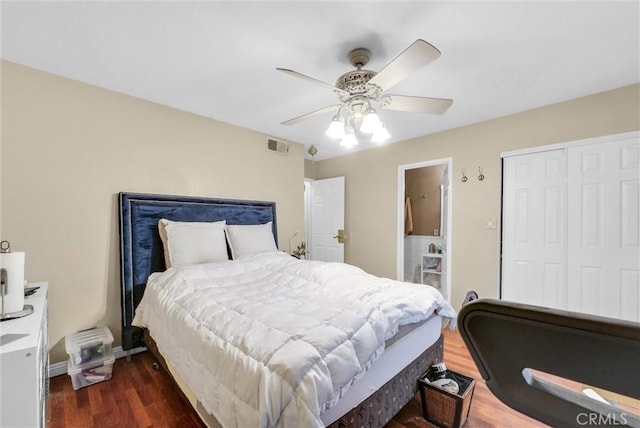 bedroom with a closet, ceiling fan, and dark hardwood / wood-style flooring