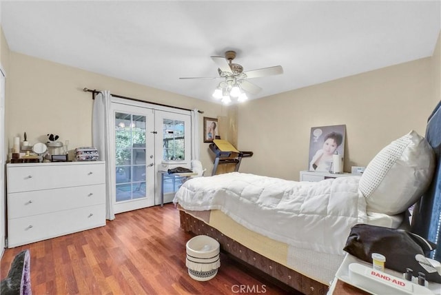 bedroom with access to outside, ceiling fan, french doors, and hardwood / wood-style floors