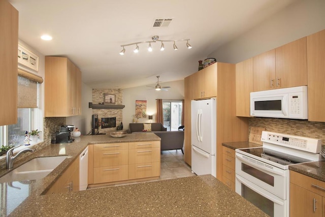 kitchen featuring ceiling fan, decorative backsplash, sink, white appliances, and light brown cabinets