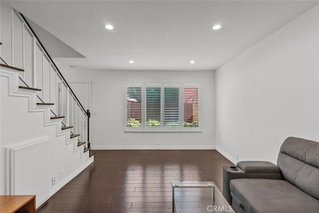 sitting room featuring dark hardwood / wood-style flooring