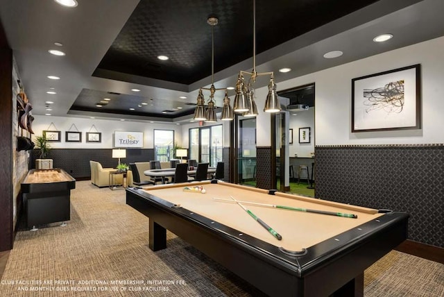 playroom with a tray ceiling, carpet flooring, and pool table