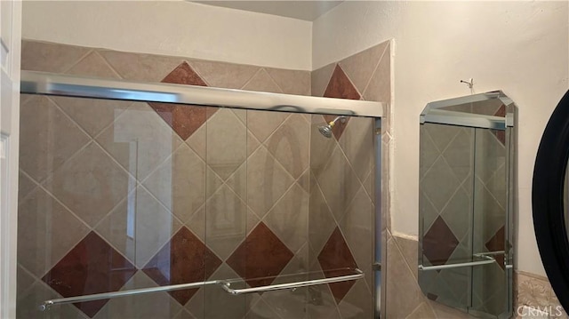 bathroom featuring walk in shower