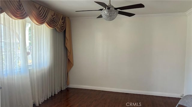 unfurnished room with ceiling fan, dark hardwood / wood-style flooring, and ornamental molding