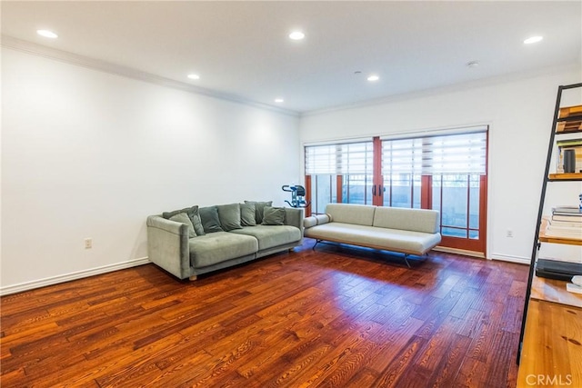 living room with ornamental molding and dark wood-type flooring