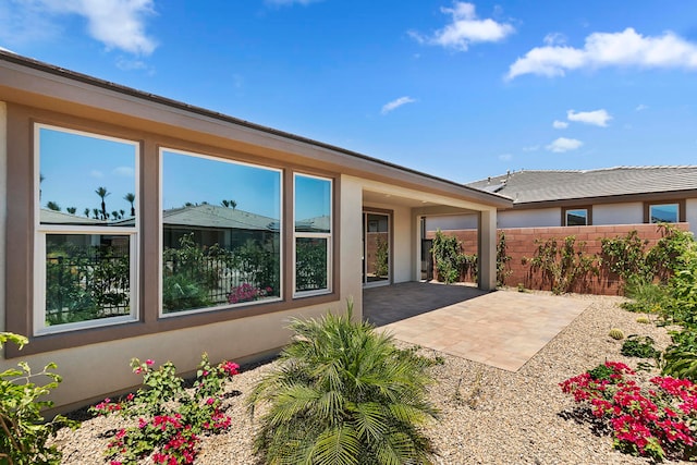 exterior space with a patio