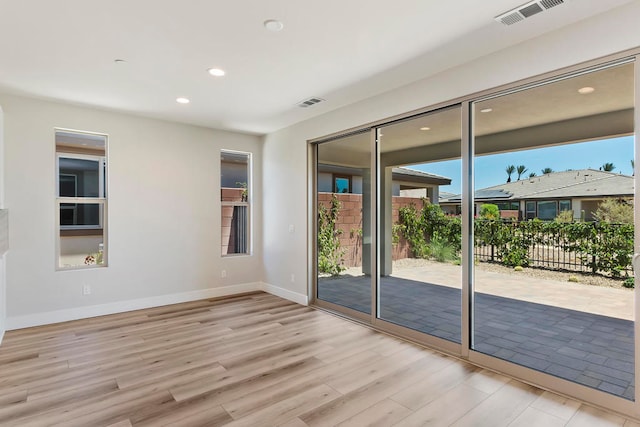 interior space with light hardwood / wood-style flooring