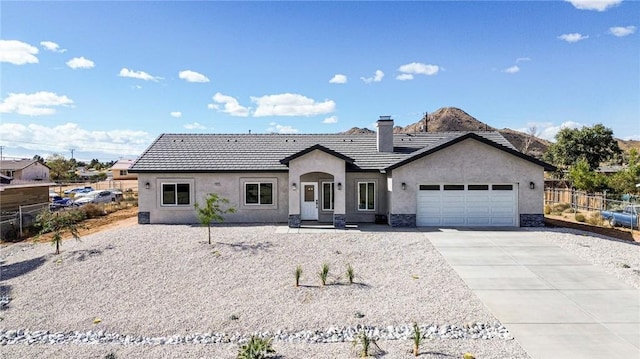 ranch-style home with a garage