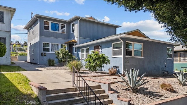 view of front of home with a patio area