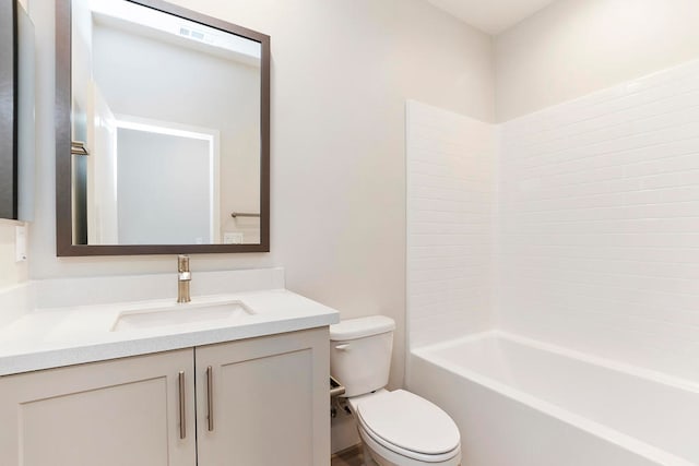 full bathroom featuring shower / tub combination, vanity, and toilet