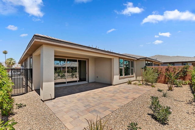 rear view of house with a patio area