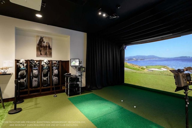 home theater with carpet flooring and golf simulator