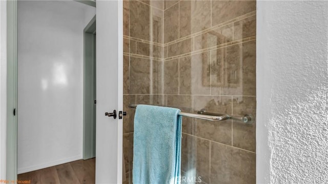 bathroom with wood finished floors