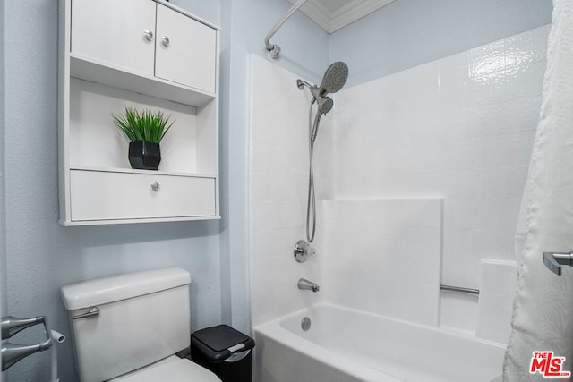 bathroom with shower / bath combination with curtain, toilet, and ornamental molding