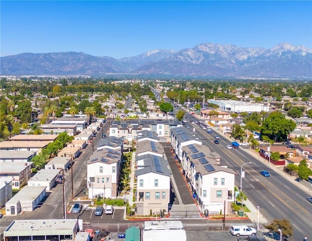 birds eye view of property featuring a mountain view