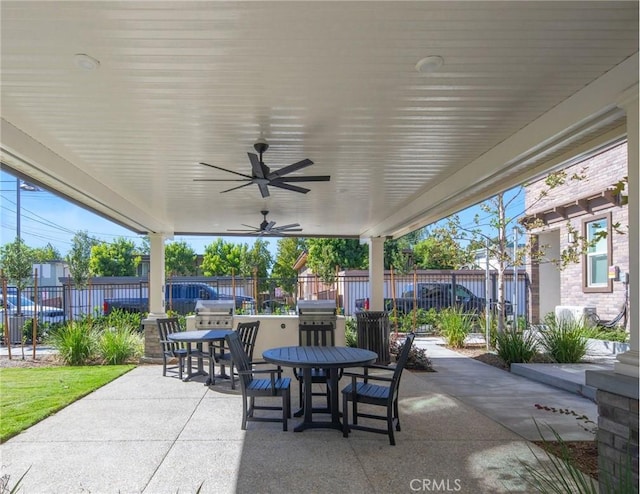 view of patio featuring ceiling fan