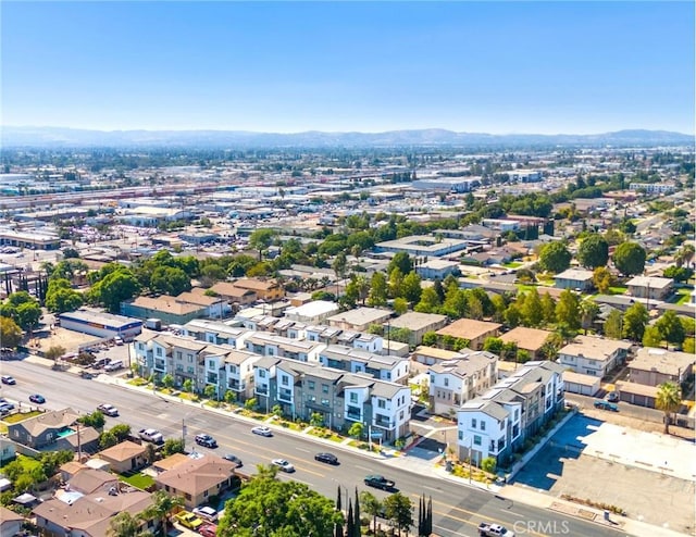 drone / aerial view featuring a mountain view