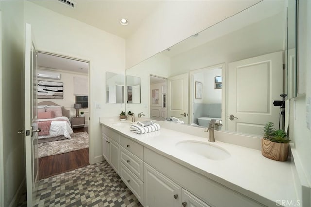 102 Catalonia, Irvine, CA 92618 - bathroom with tile patterned floors, double vanity, visible vents, a sink, and ensuite bathroom