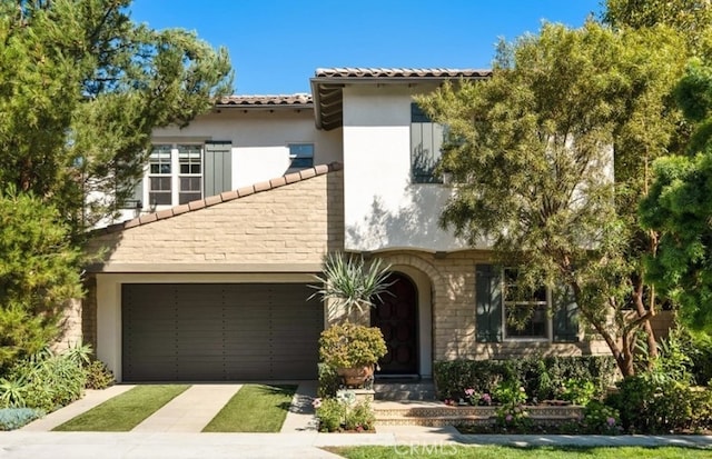 102 Catalonia, Irvine, CA 92618 - mediterranean / spanish-style house with stucco siding, a tile roof, driveway, and a garage