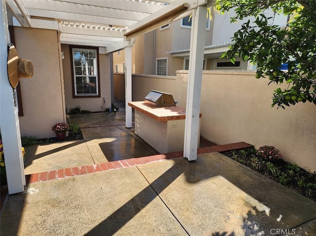 view of patio / terrace with a pergola