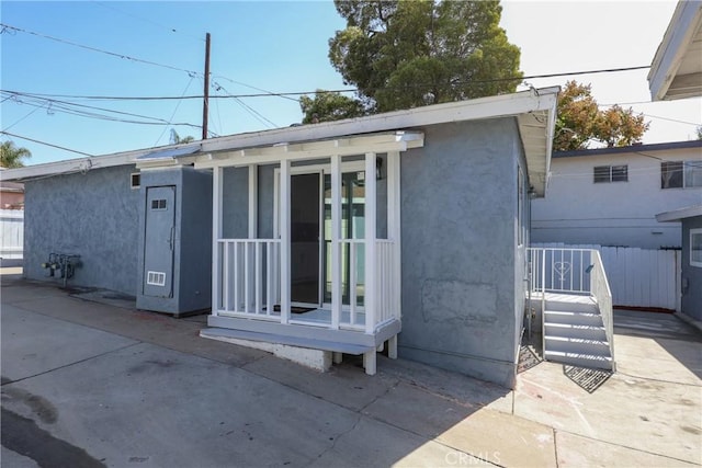 rear view of house featuring a patio area