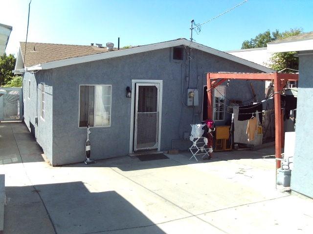 rear view of property featuring a patio area