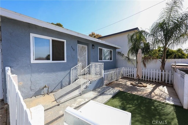 single story home with a patio area