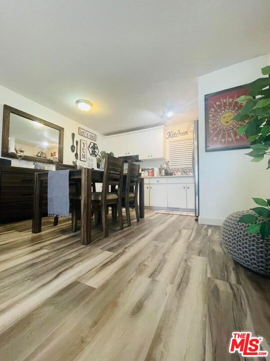 dining area with light hardwood / wood-style flooring