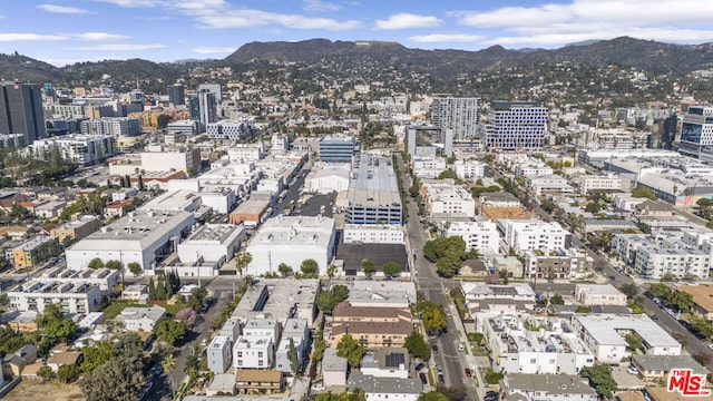 aerial view featuring a mountain view