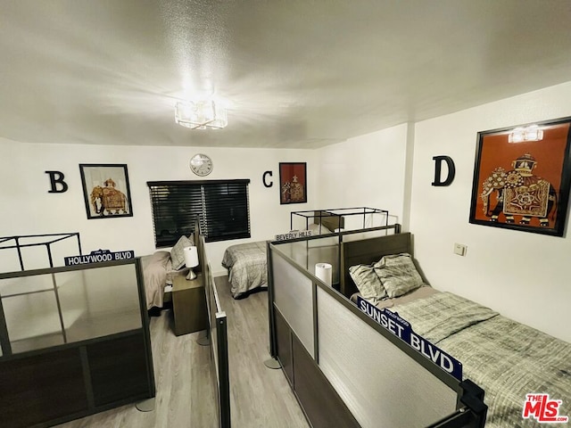 bedroom featuring light hardwood / wood-style floors