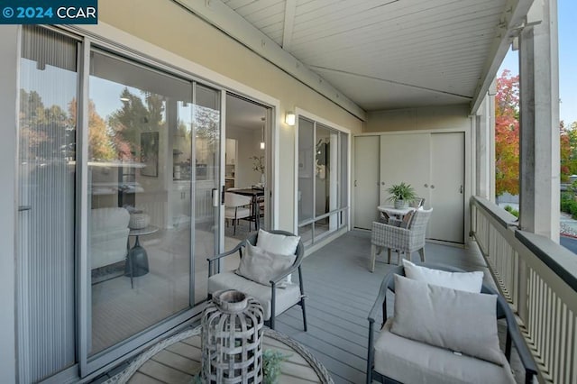 sunroom / solarium featuring plenty of natural light