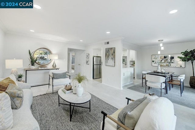 living room featuring ornamental molding