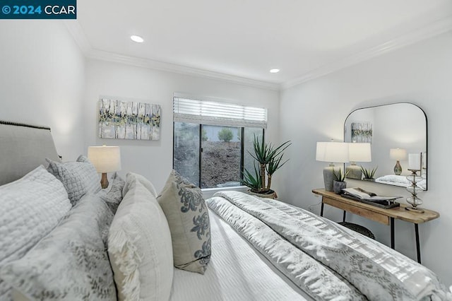 bedroom with crown molding