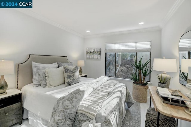 carpeted bedroom featuring ornamental molding