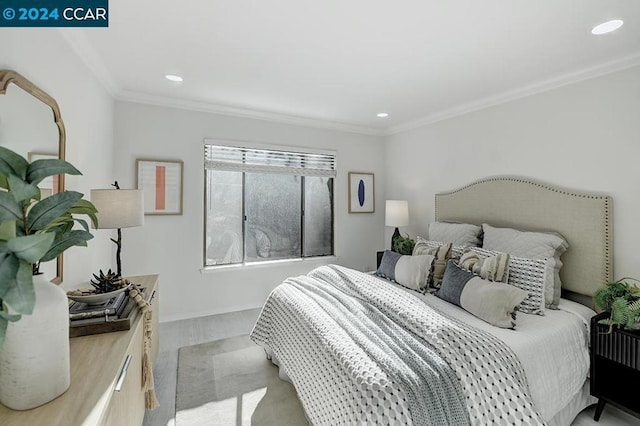 carpeted bedroom with crown molding