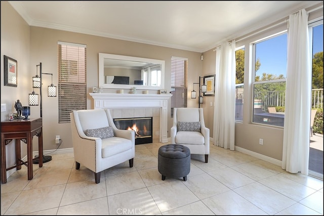 living area with a fireplace, a wealth of natural light, and ornamental molding