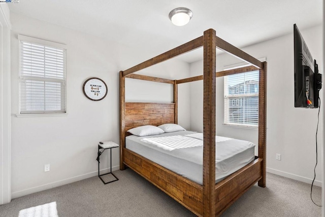 bedroom with light carpet