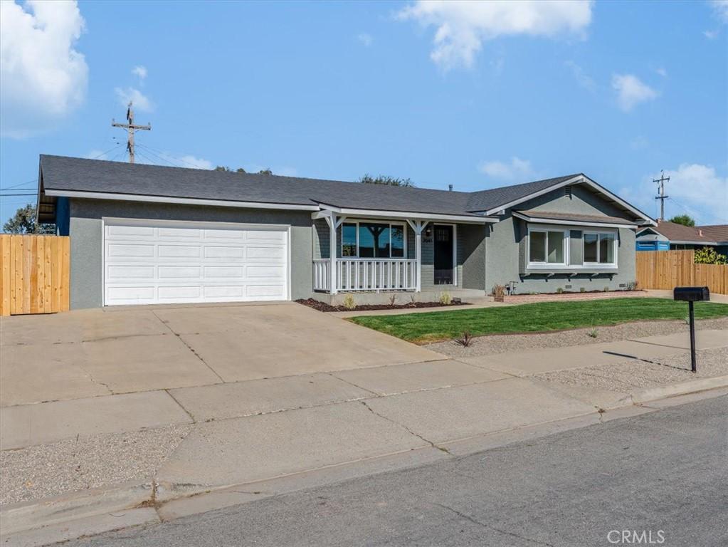 2041 Sandalwood Dr, Santa Maria, CA 93455 - ranch-style home with a porch and a garage