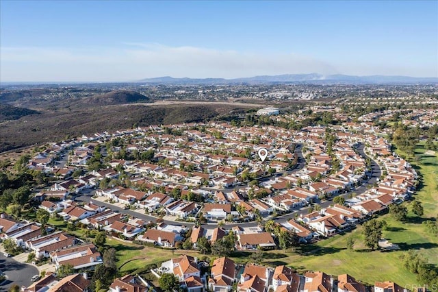 drone / aerial view featuring a mountain view