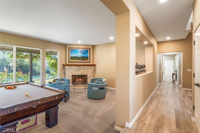 game room with a stone fireplace, pool table, recessed lighting, and baseboards