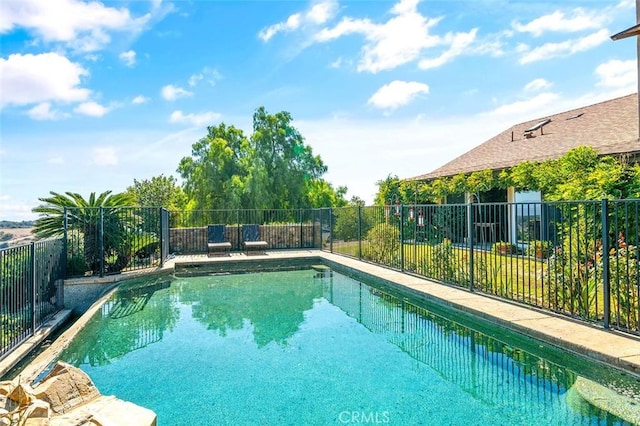 view of pool with fence and a fenced in pool