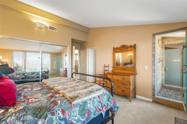 carpeted bedroom with visible vents, baseboards, a closet, and vaulted ceiling