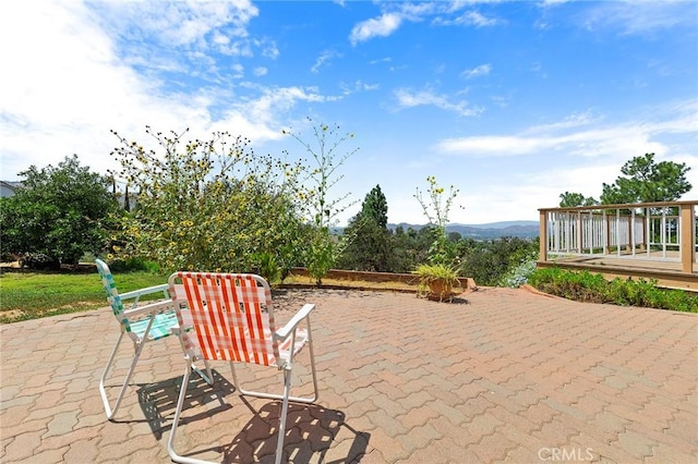 view of patio featuring a wooden deck