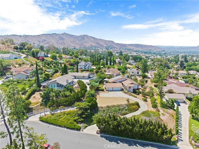 drone / aerial view featuring a mountain view